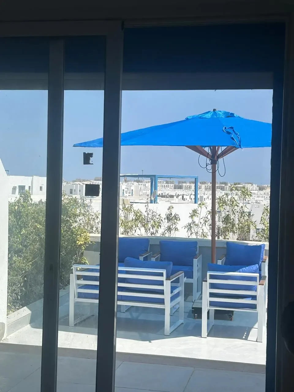 White metal set with blue cushions from a real Nestica delivery in 6th of October